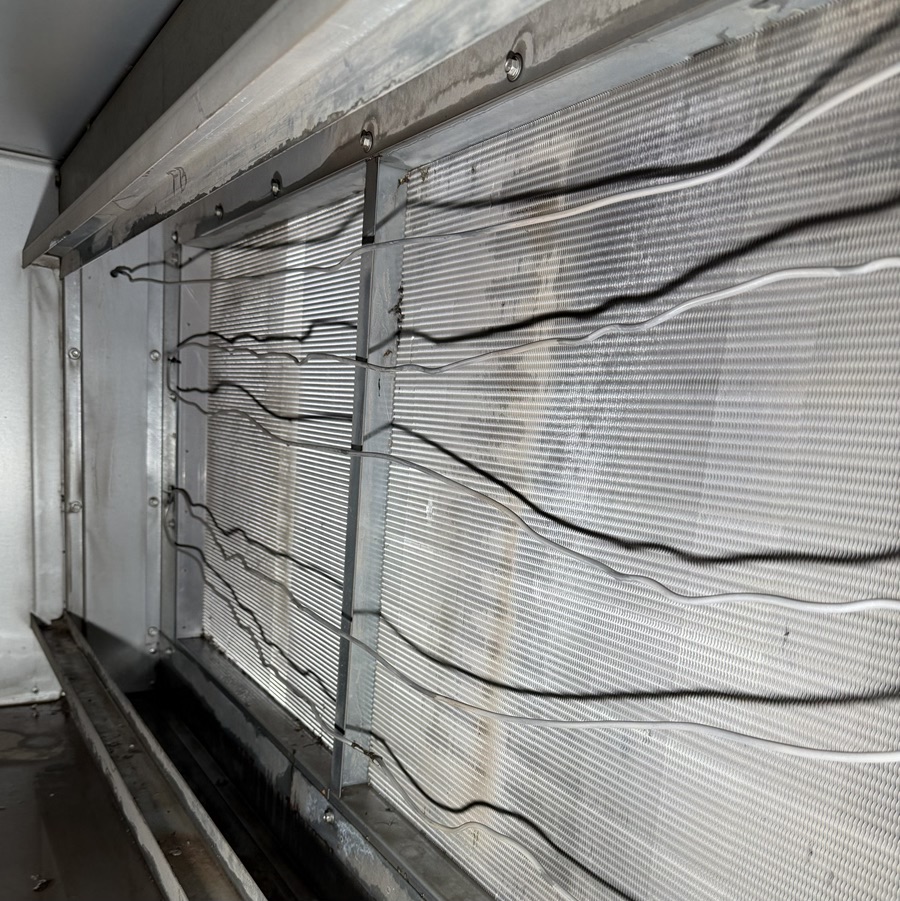 commercial HVAC coils inside an air handler