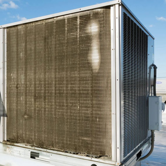 Dirty outdoor commercial coil on a rooftop